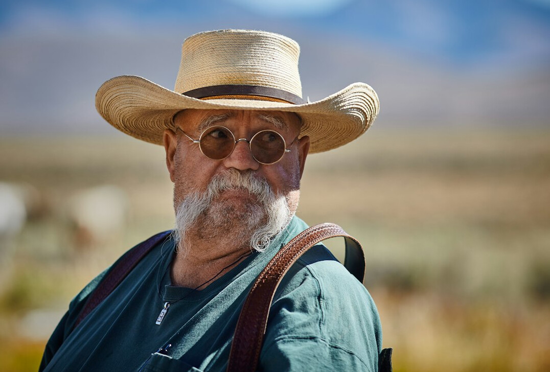 Portrait of a German male research director in his 50s wearing glasses