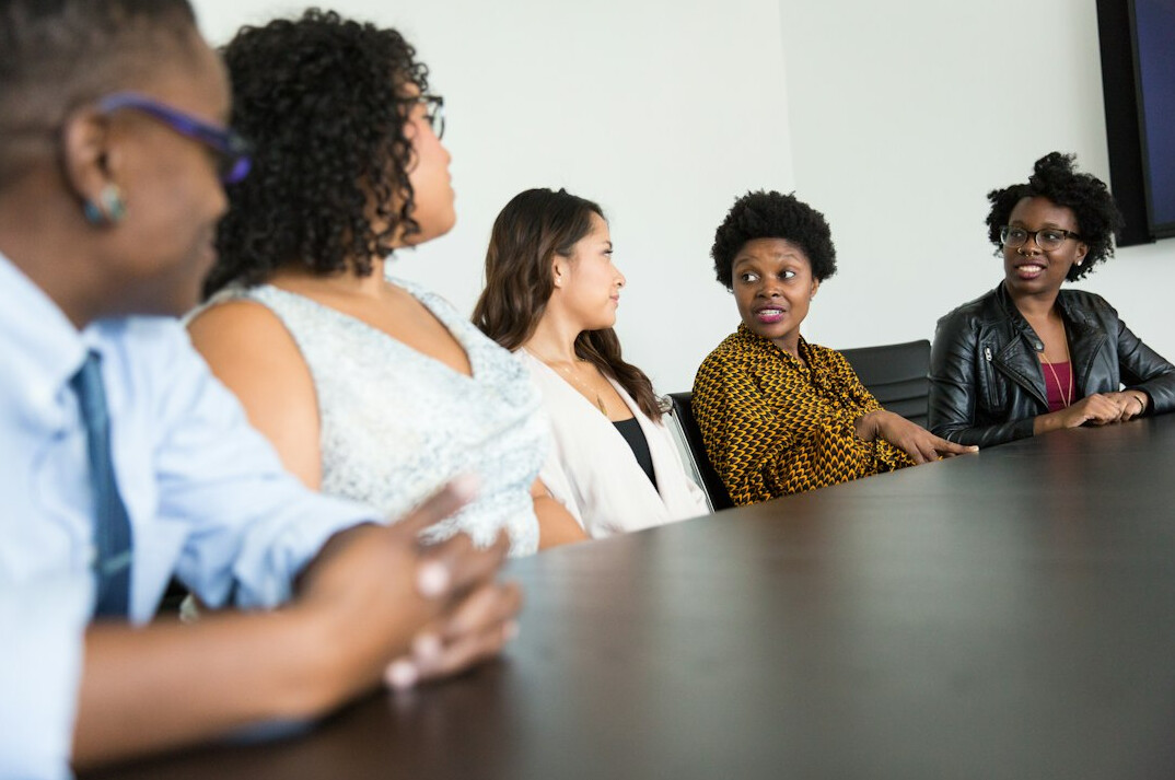 diverse group discussing equality